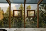 Interior view with wooden frames and forest view