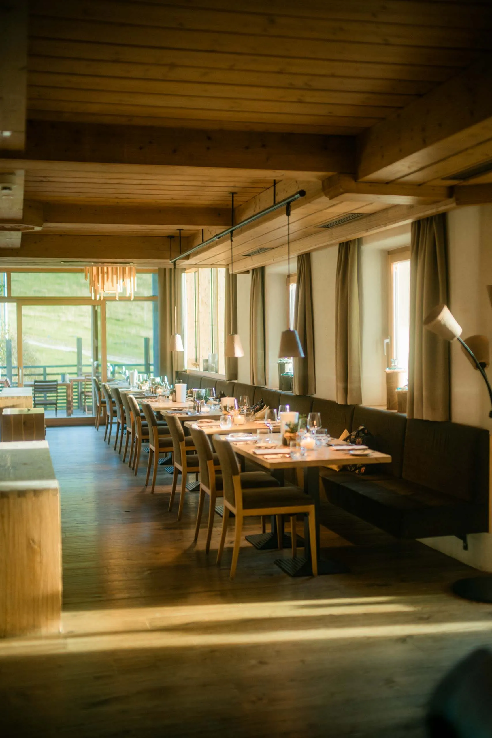 Interior view of a restaurant in Holzhotel Forsthofalm, Leogang