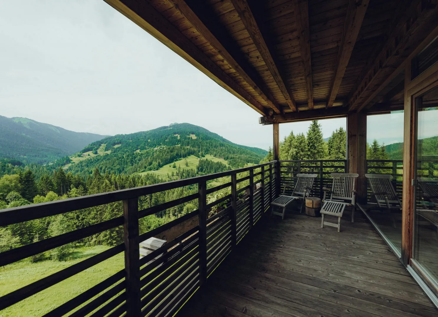 Balcony overlooking wooded mountains and valleys