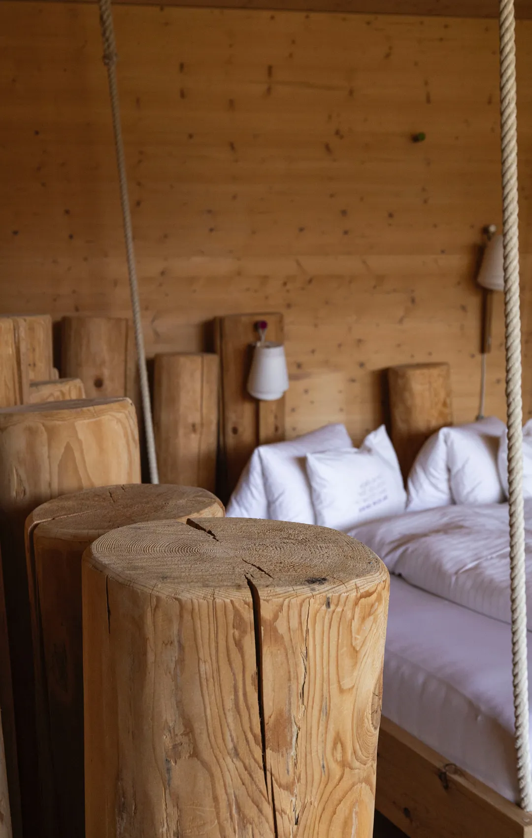 Wooden furniture and bed in a cozy, rustic interior setting