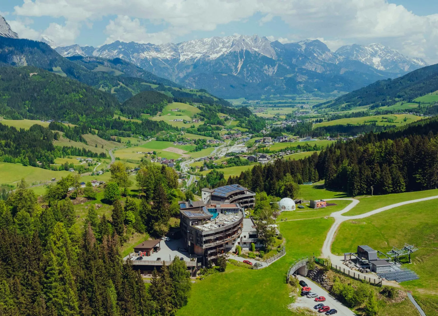 Mountain landscape with a hotel in the Alps