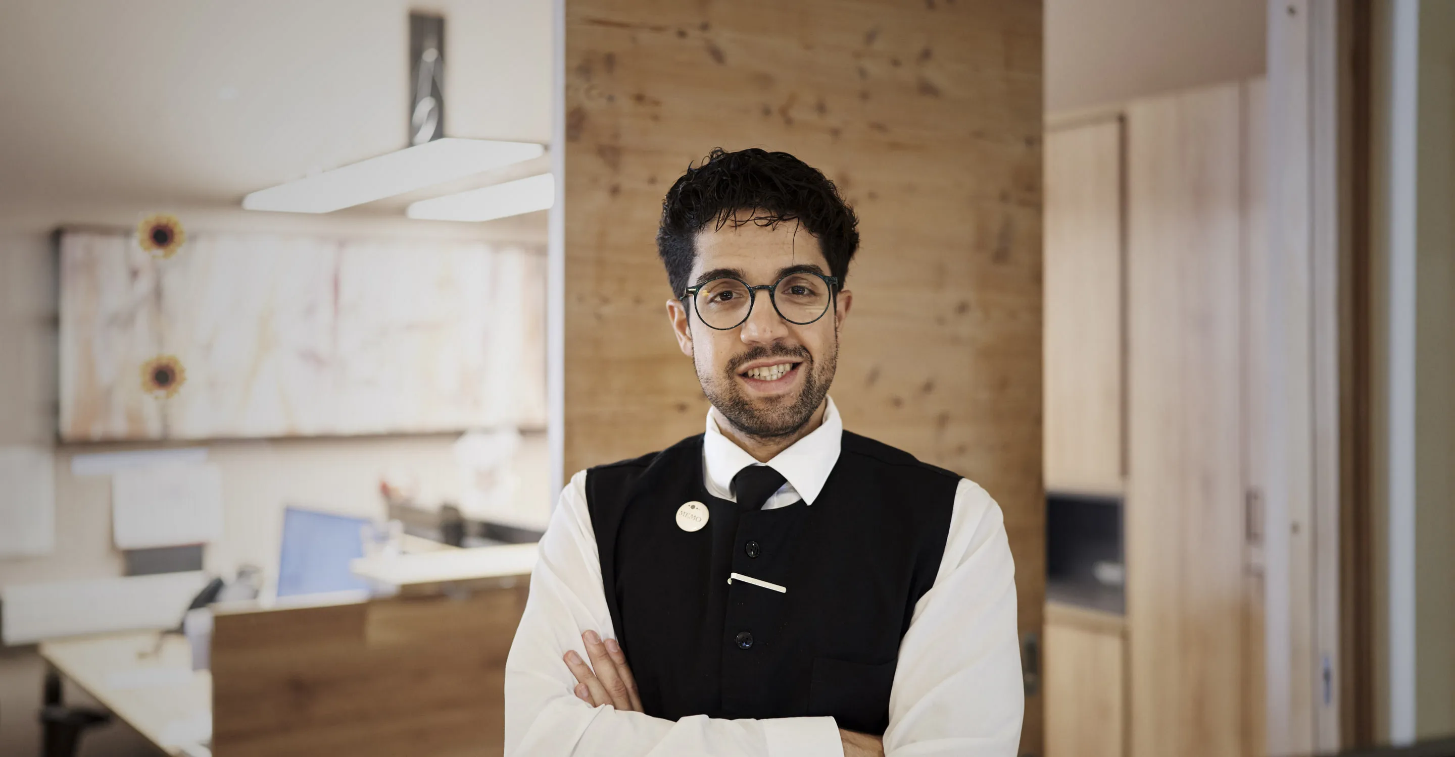 Smiling intern in a modern office setting
